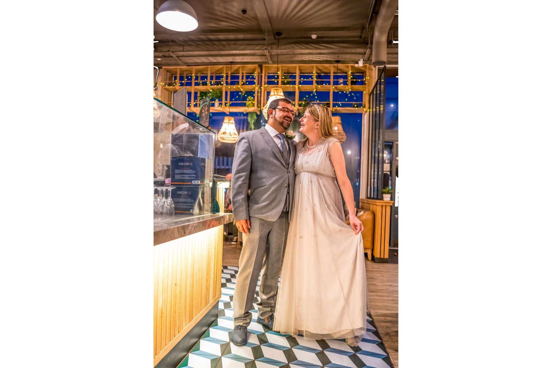 Wedding couple holding hands in the city